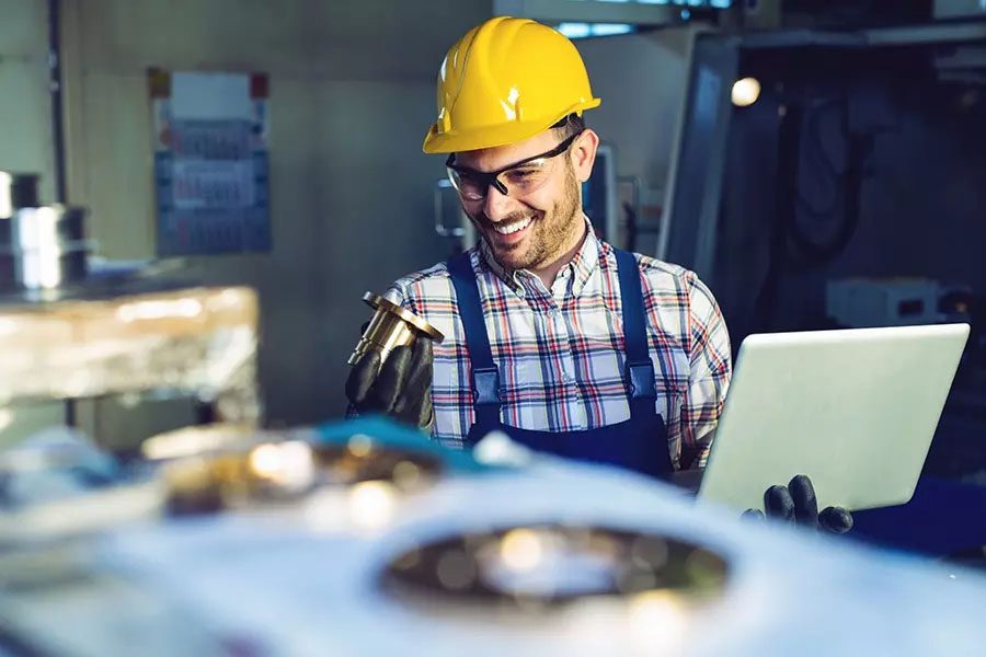 Mechanical-Contractor-Insurance-Mechanical-Contractor-Technician-Measuring-with-Caliper-in-a-Workshop